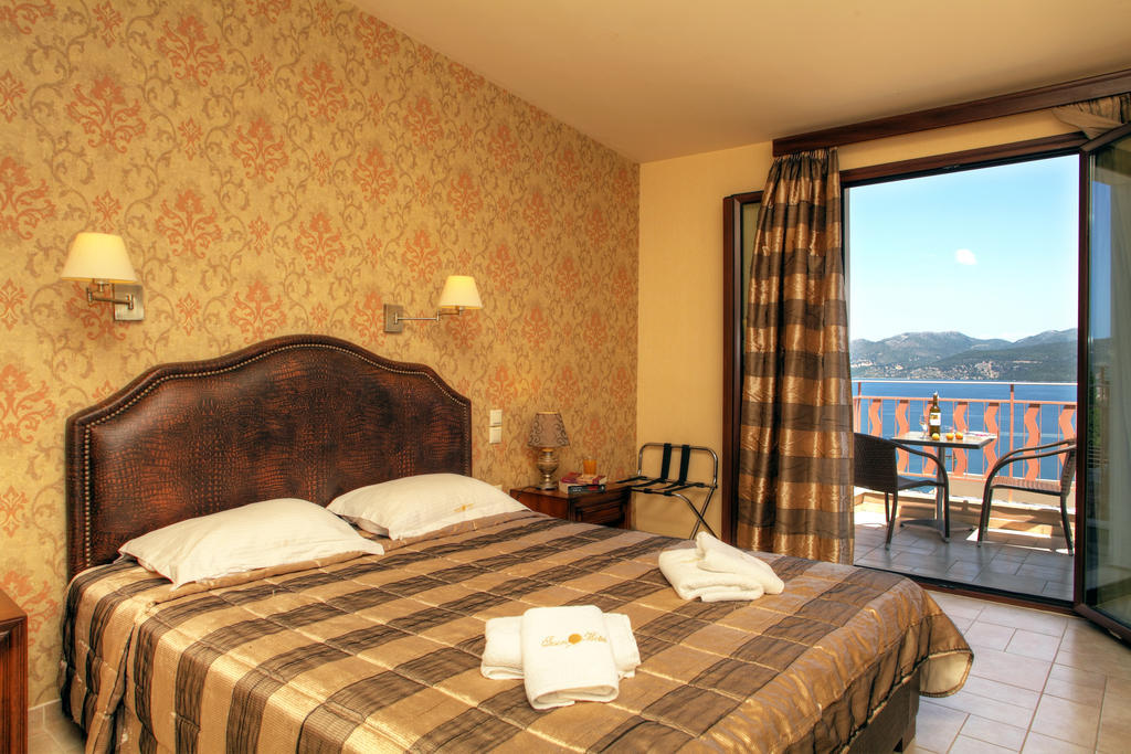 Hotel Tesoro Nikiana Quarto foto