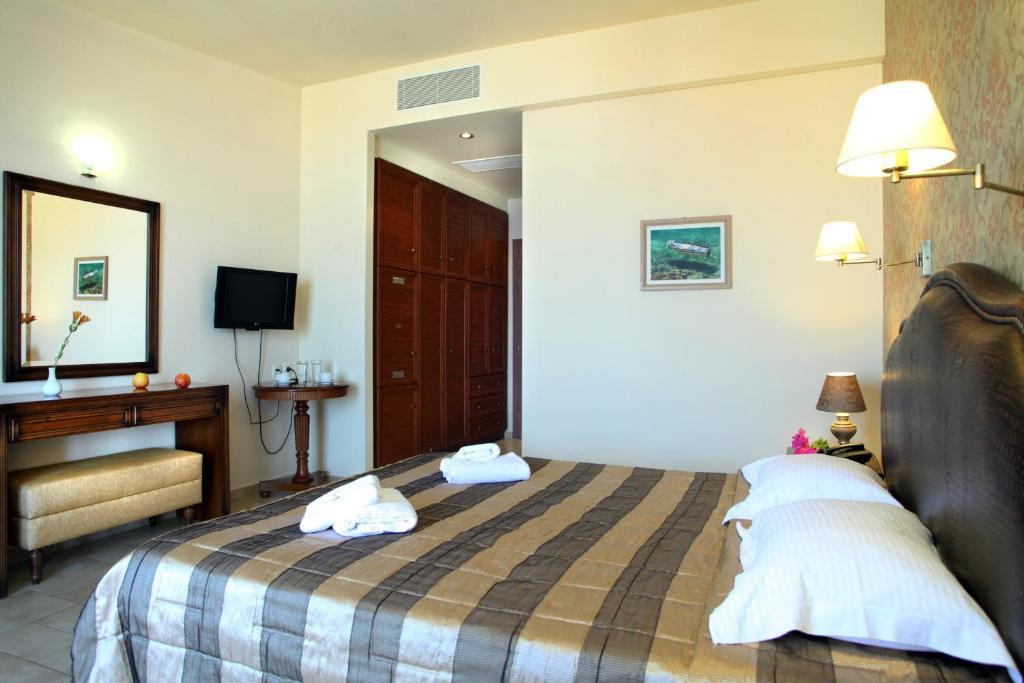 Hotel Tesoro Nikiana Quarto foto